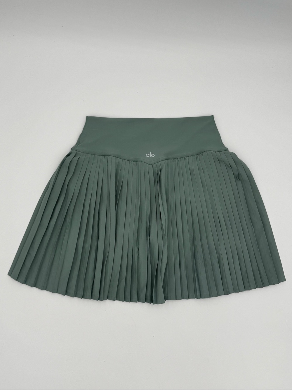 Alo pleated tennis shirt